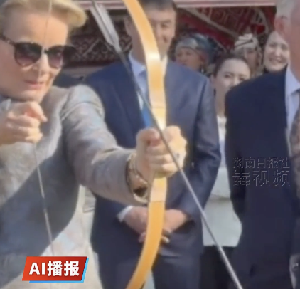 比利时国王夫妇访哈体验射箭画面