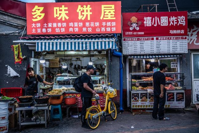 清华博士生出没零工市场八年,想为工友们开一家公益浴室